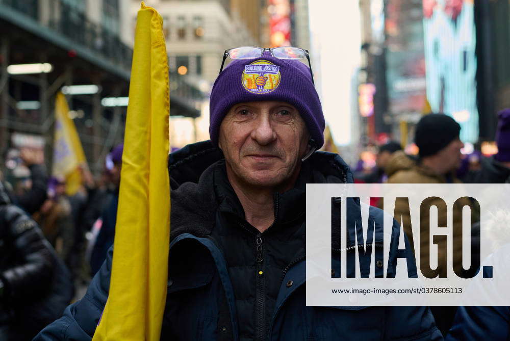 December 20, 2023, New York, New York, USA: Members of the 32BJ union ...