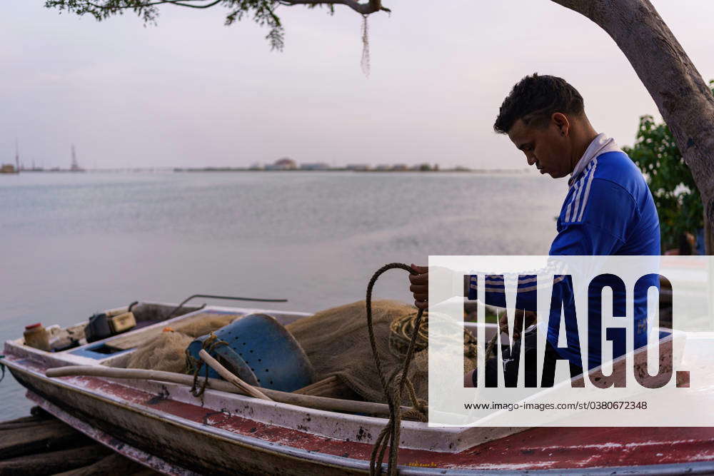 December 27, 2023, Cabimas, Venezuela: A fisherman is preparing his ...