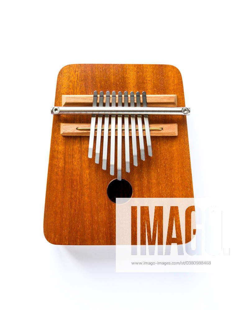 Traditional wooden kalimba isolated on white Traditional wooden kalimba ...