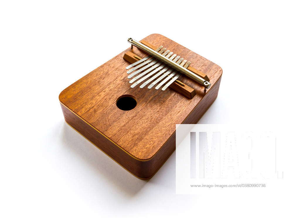 Traditional wooden kalimba isolated on white Traditional wooden kalimba ...