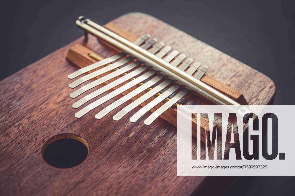 Traditional wooden kalimba isolated on black Traditional wooden kalimba ...