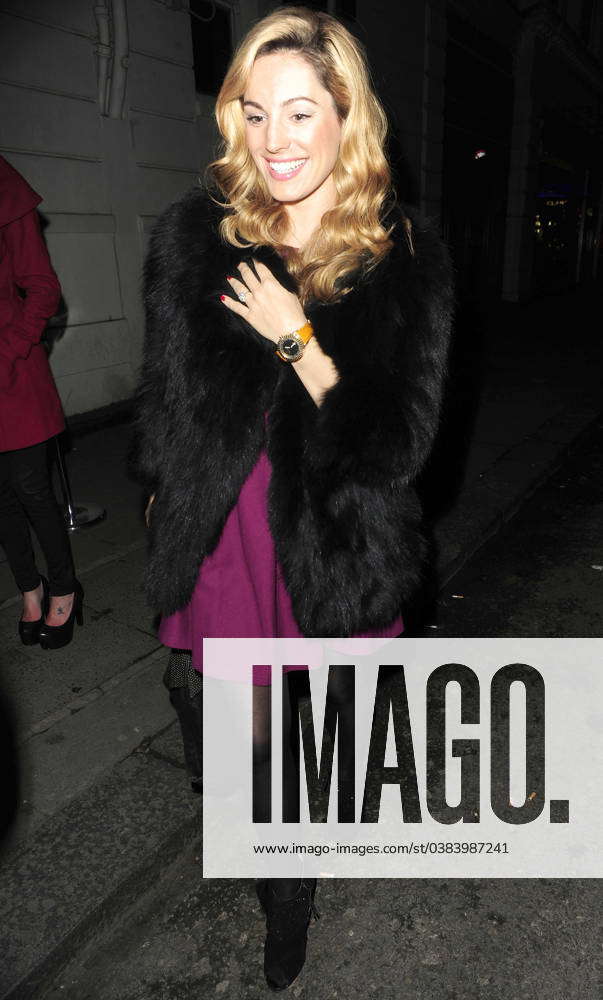 The gorgeous Kelly Brook is seen wrapped up in a fur coat to keep out ...