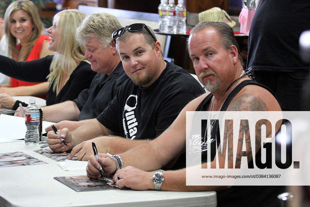 Storage Wars cast members Darrell The Gambler Sheets, Brandi Passante and  her husband Jarrod