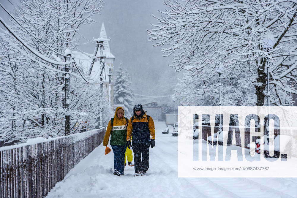 RUSSIA KRASNODAR REGION JANUARY 12 2024 People Walk Past Snow   M 