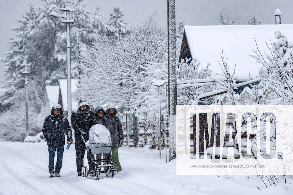 RUSSIA KRASNODAR REGION JANUARY 12 2024 People Walk Past Snow   M 