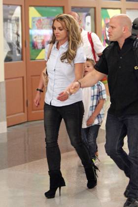 A tired looking Britney Spears seen with her father Jamie and two sons ...