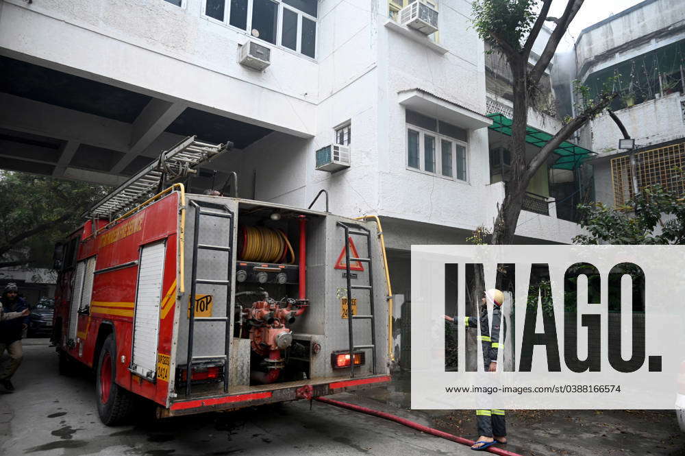 NOIDA, INDIA – JANUARY 14: A team of Firefighters trying to extinguish ...