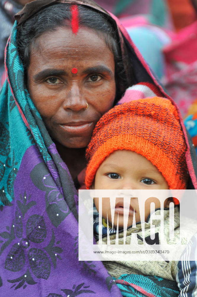 January 17, 2024: Sylhet, Bangladesh: A toddler in a guardian s lap on ...