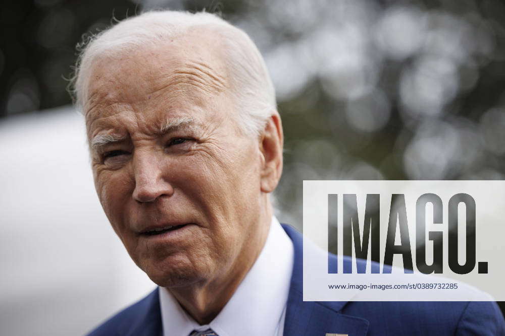 United States President Joe Biden walks on the South Lawn of the White ...