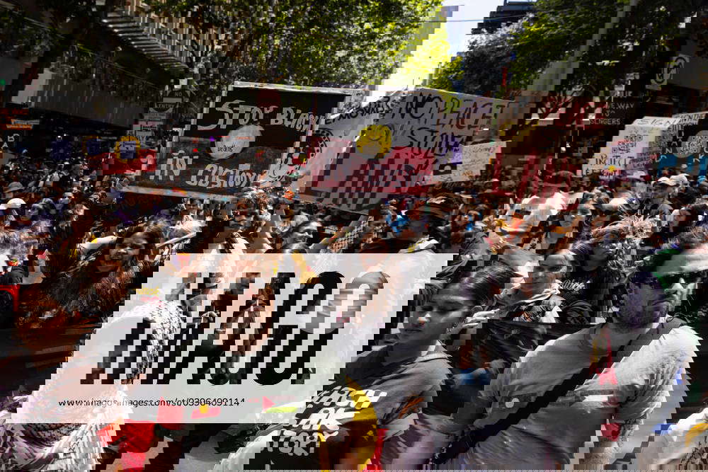 AUSTRALIA DAY 2024 MELBOURNE, People march towards Flinders Street Station during the Invasion Day