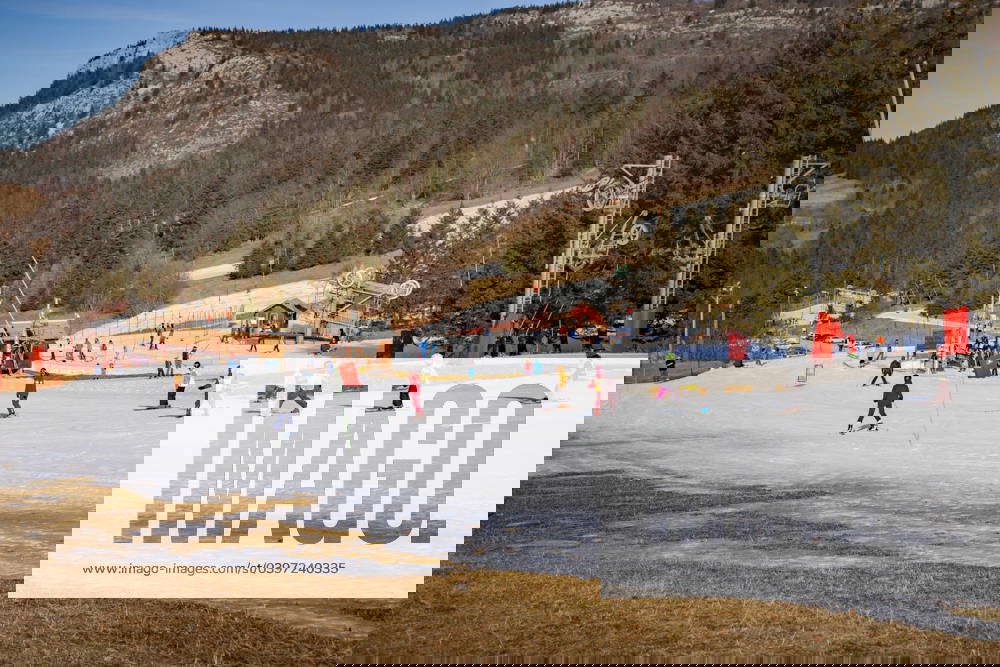 Lans en Vercors Ski Resort France Skiers slide on a tongue of snow in