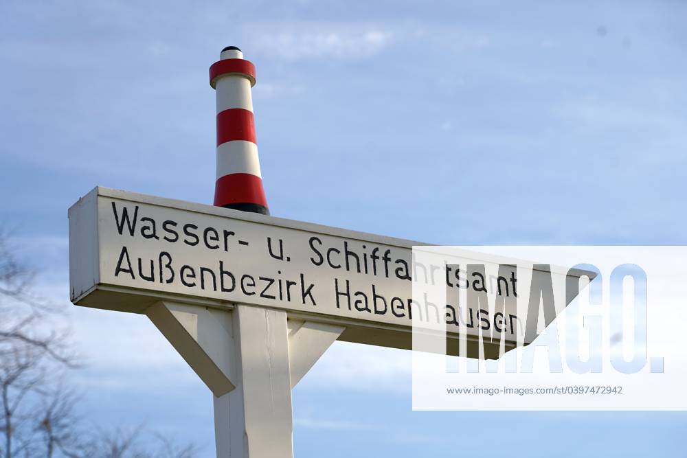 Historical signpost on the edge of the Bremen Weser weir to the Water