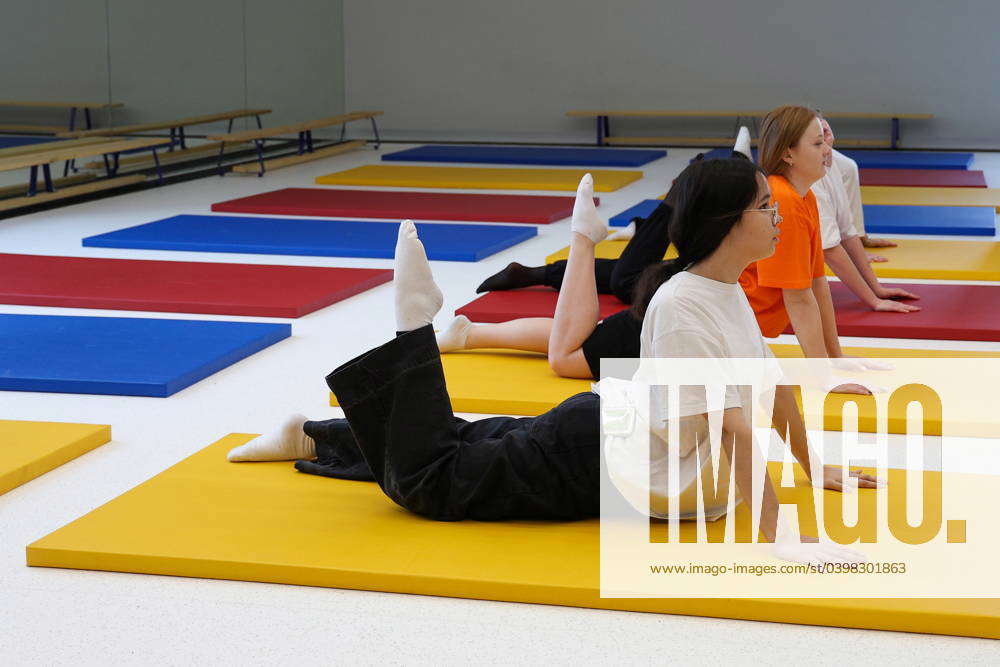 RUSSIA, REPUBLIC OF TATARSTAN - FEBRUARY 1, 2024: Girls practice yoga ...