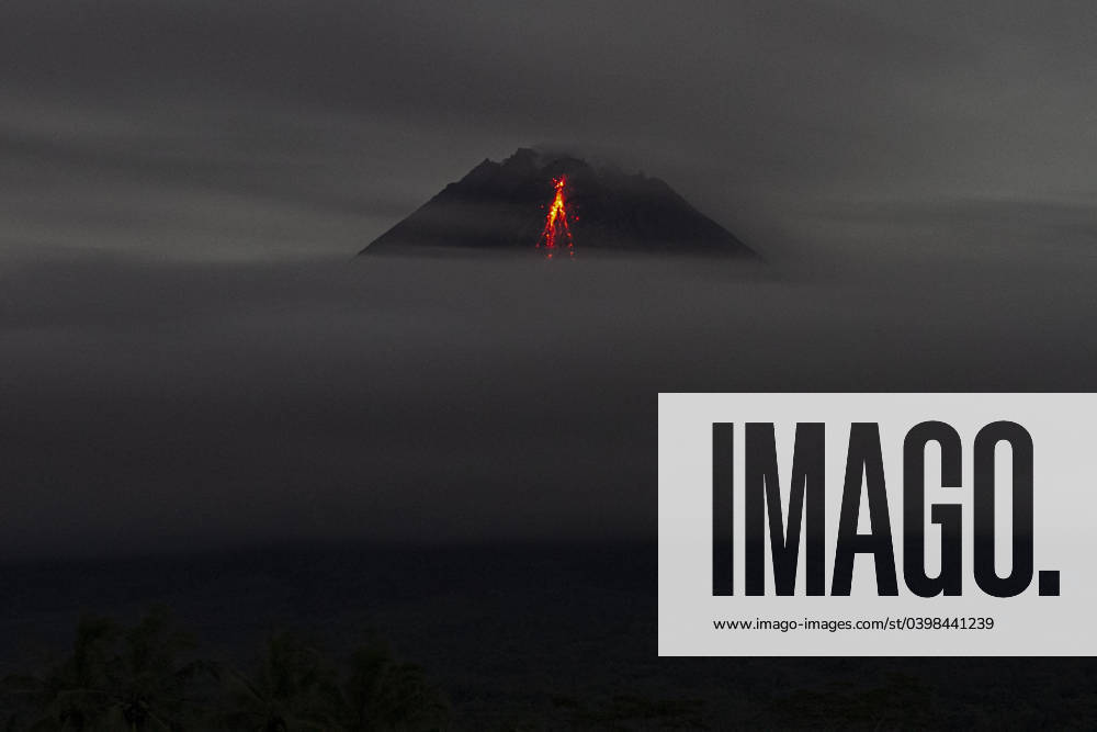 Mount Merapi Image Material Magelang, Central Java, Indonesia: Mount Merapi spews volcanic material ...