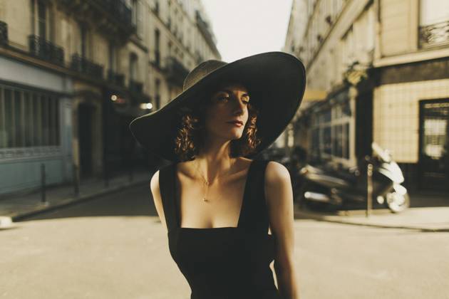 Glamorous Caucasian woman standing in city street Eraterinburg, Russia ...