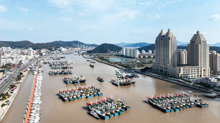 ZHOUSHAN, CHINA - FEBRUARY 08: Aerial view of fishing boats returning ...