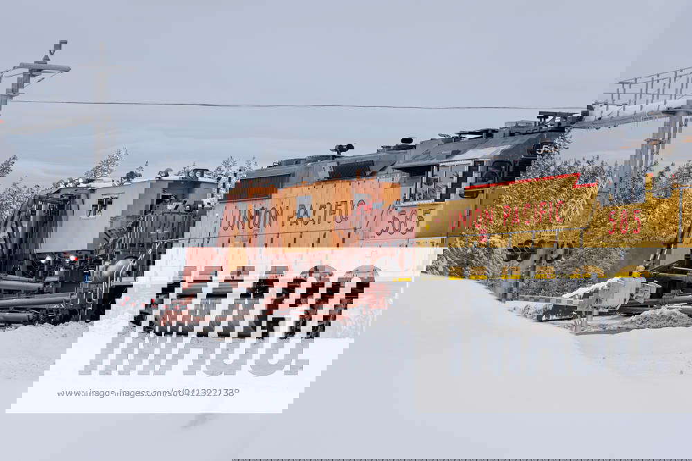 Union Pacific Train Crews Plow Tracks. Union Pacific train crews are