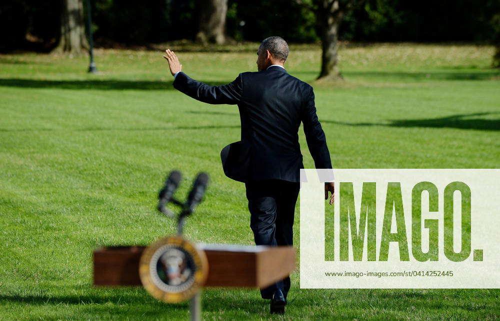 Obama Delivers a Statement on Ebola United States President Obama waves ...