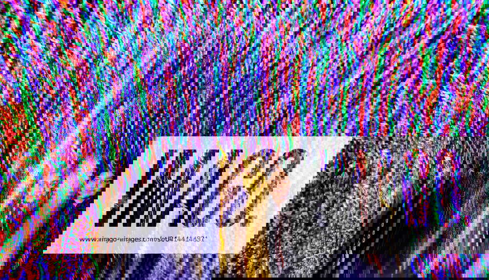 Brampton Winter Lights Two friends are posing for a photo inside an