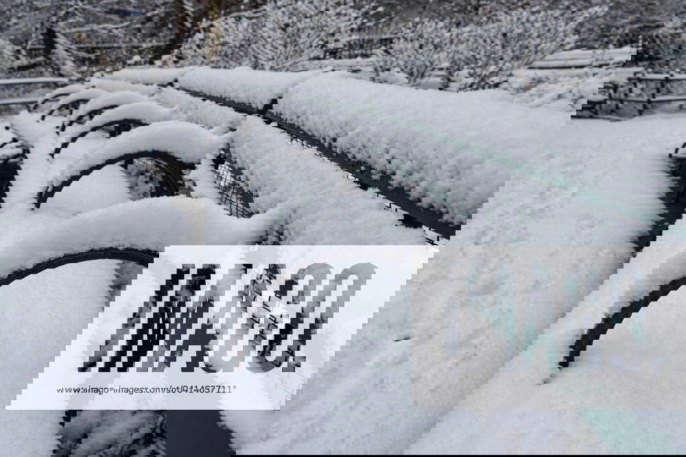 NYC Weather Snow is covering a bench in Stuyvesant Park after a winter