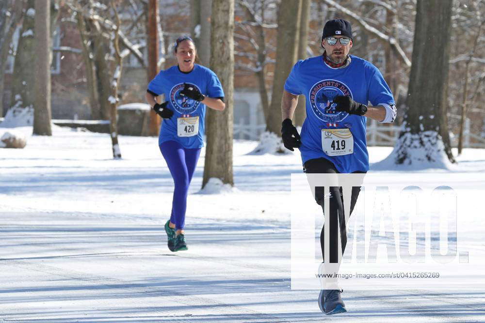 Syndication: The News-Messenger Forty-two runners prepare for the start ...