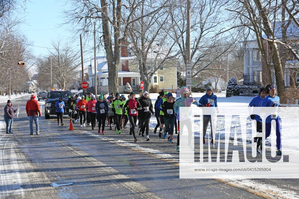 Syndication: The News-Messenger Forty-two runners prepare for the start ...