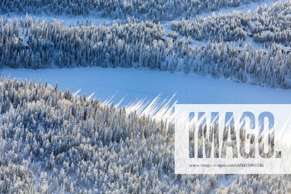 Snowed in Lakeside cabins Finnish Lapland Finland