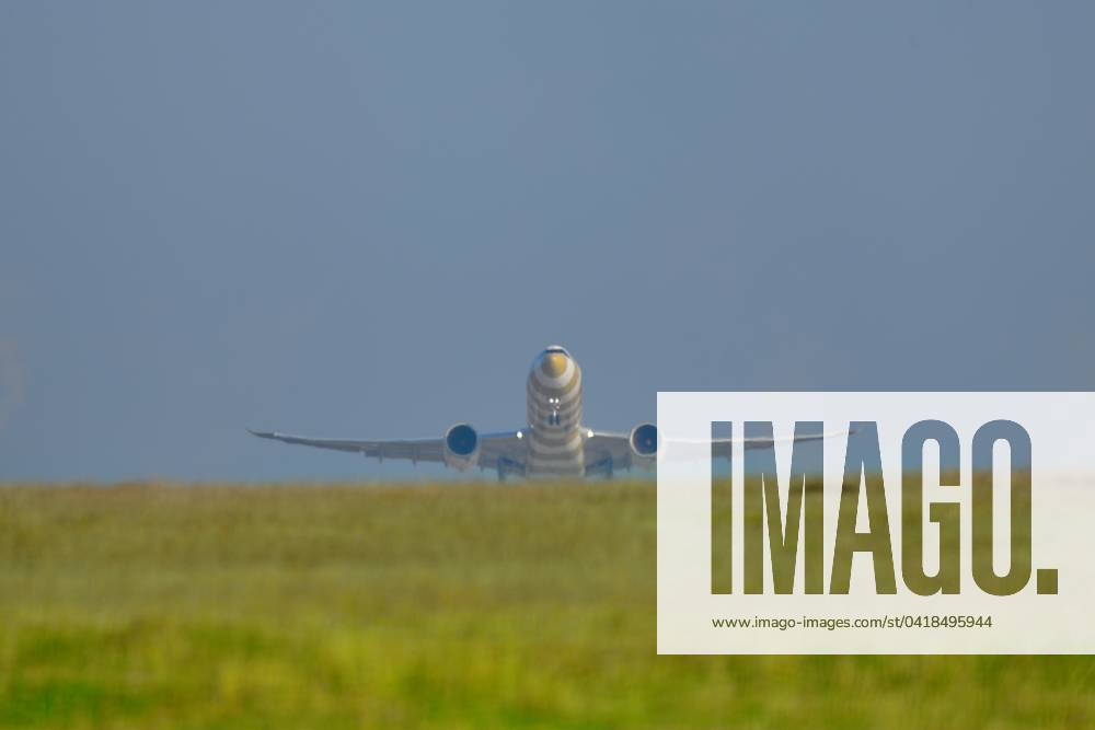 28 2 2024 Fly green We fly green A jet takes off from a meadow in ...