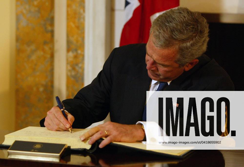 Bush Signs Condolence Book at British Embassy Washington, D.C ...