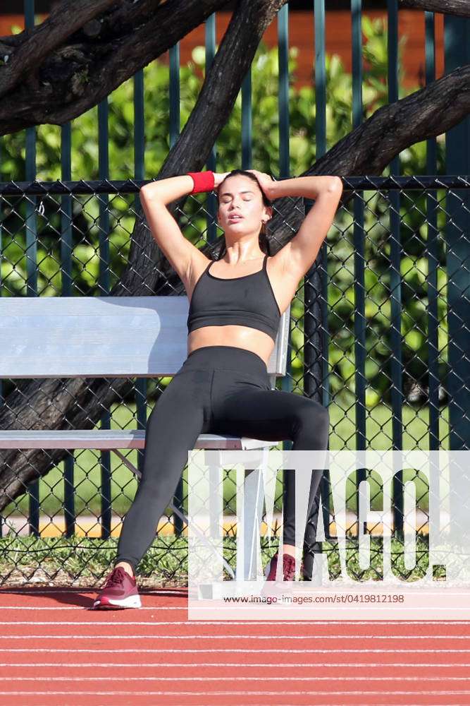 Sara Sampaio shows off her toned figure in a sports bra during a