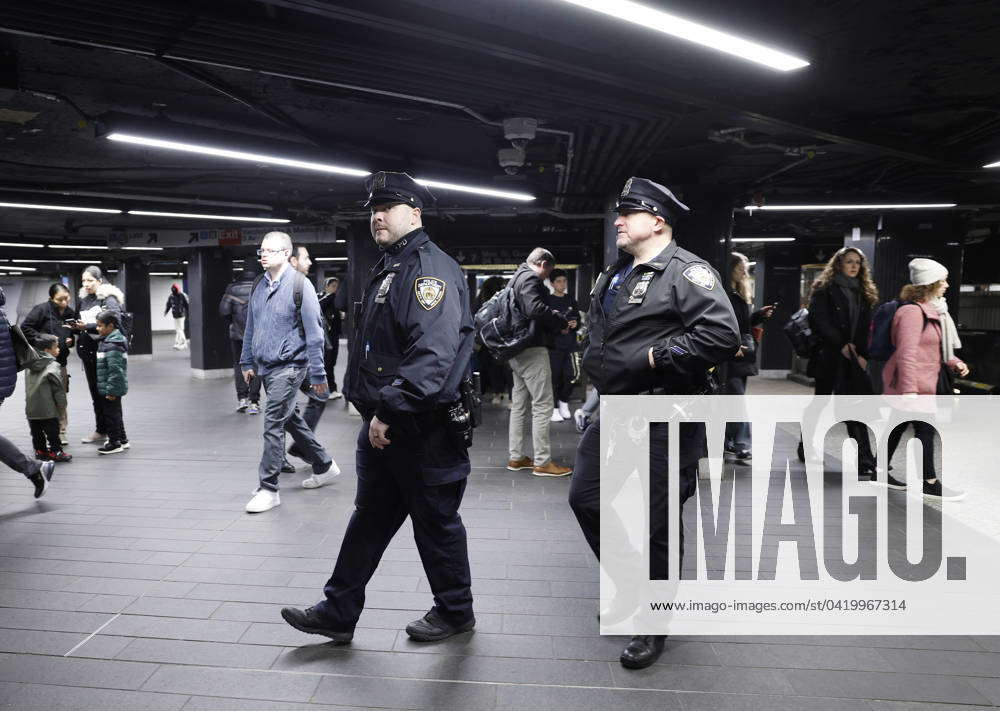 NYPD police officers patrol the subway at Grand Central Station on ...