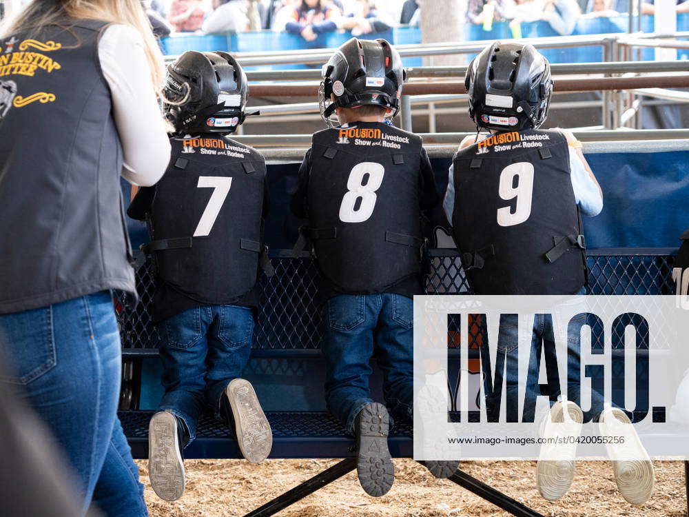 (240310) -- HOUSTON, March 10, 2024 -- Three children wait to ...