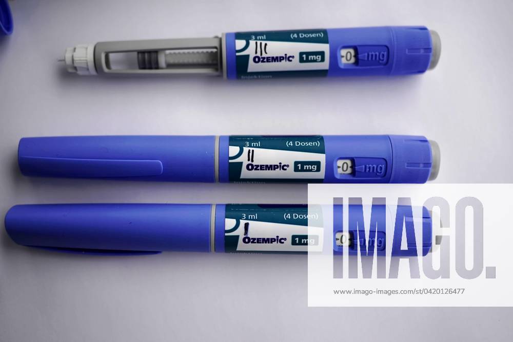 Three Blue Insulin pens for Diabetics at a white Surface, Dosage from ...