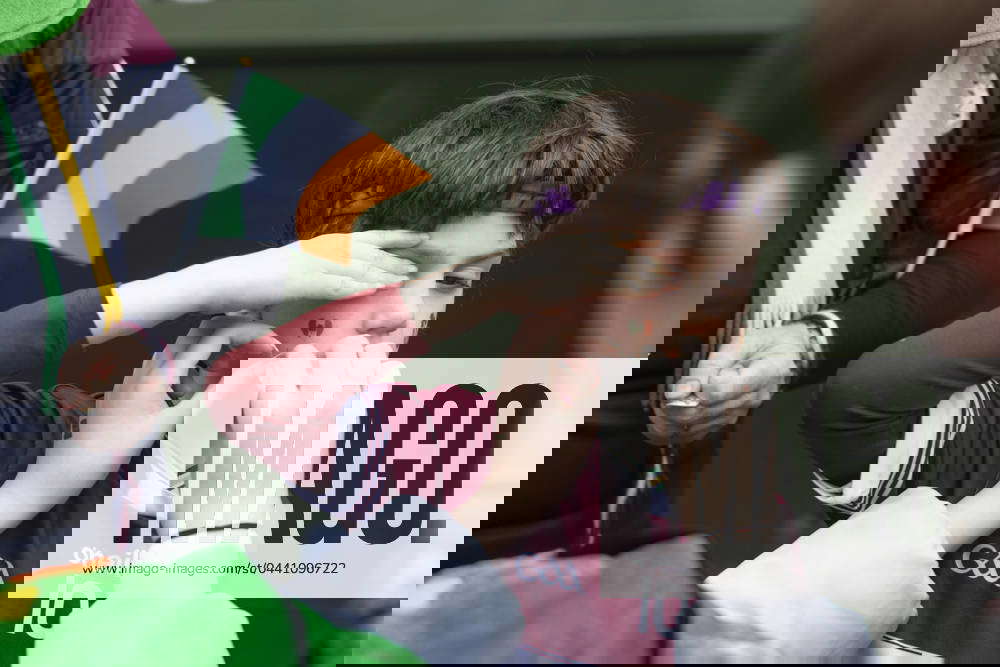 St Patrick s Day celebration in London, UK 17 Mar 2024 A child is seen getting a temporary Irish