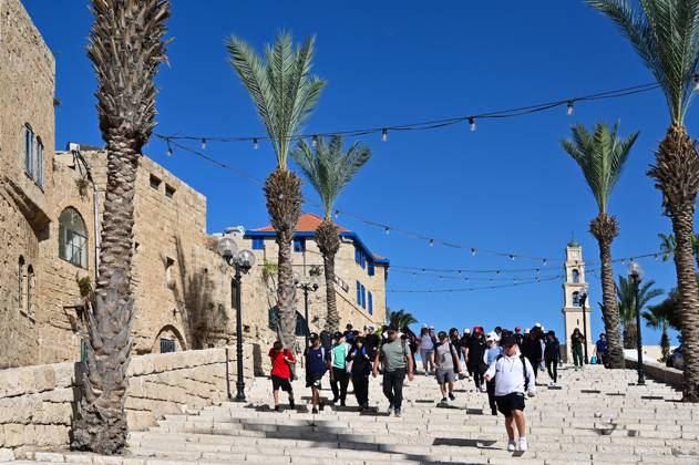 Tourists in Jaffa port city Israel TEL AVIV JAFFA - NOV 23 2022 ...