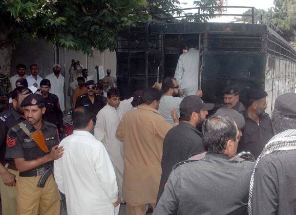 QUETTA, PAKISTAN, JUN 14: Policemen arrest protesters during protest ...