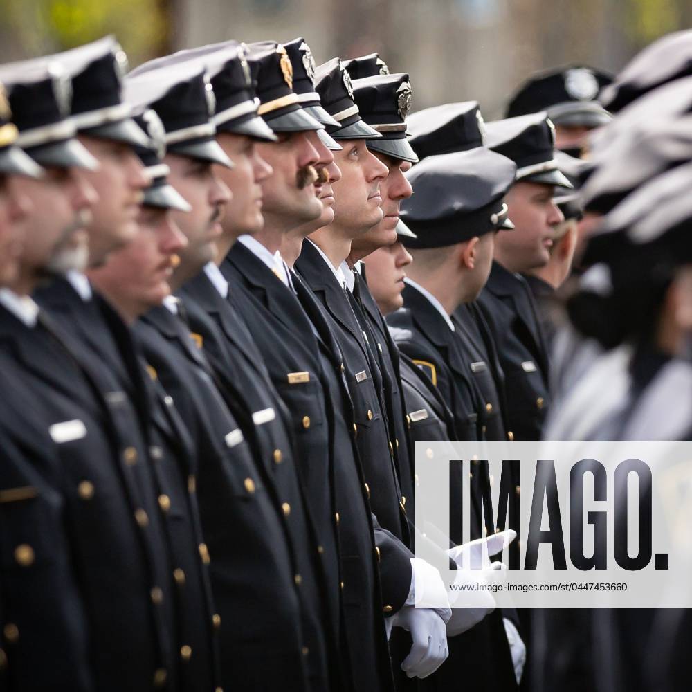 Syndication: Utica Observer Dispatch Syracuse police officers stand in ...