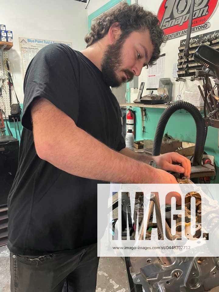 Syndication Norwich Bulletin Kyle Chaluto checks the valve clearance