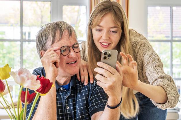 Daughter gives her father tips for his iPhone, Gen Z and Boomer, Munich ...