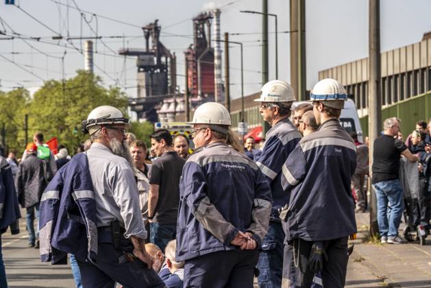 Steelworkers at a demonstration in front of the headquarters of ...