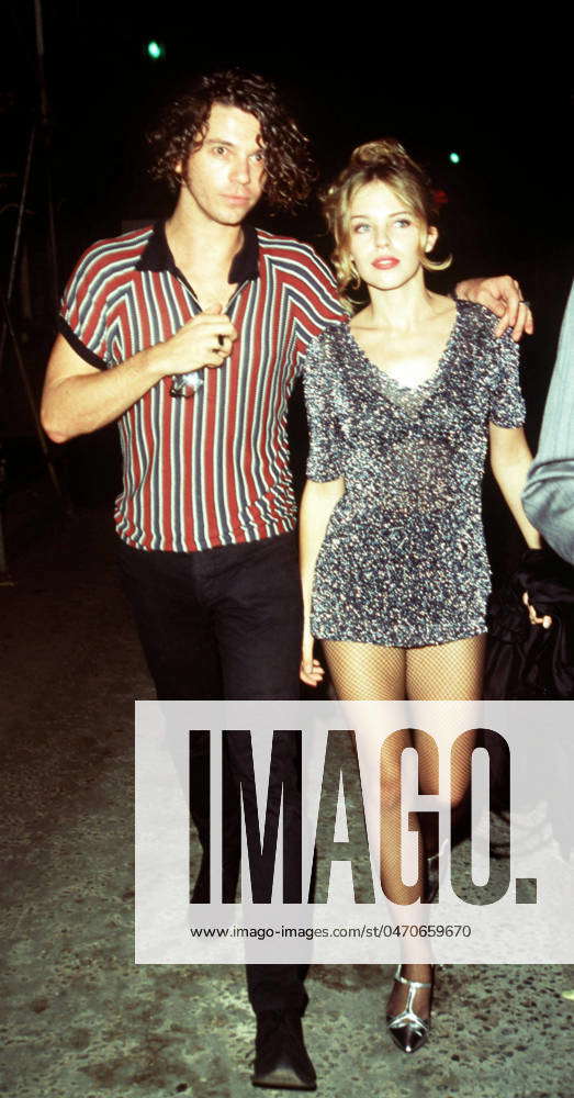 Kylie Minogue with Michael Hutchence from INXS, December 1997 FAMOUS ...