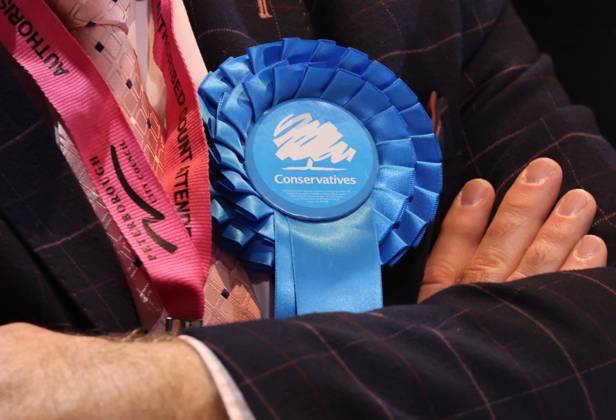 A blue Conservative rosette. Voting forms are in, and counting has ...