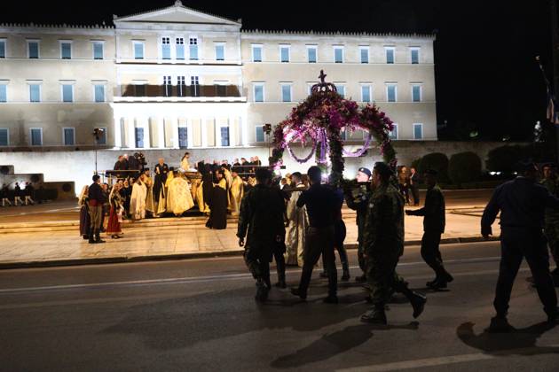 Men carry an Epitaph in front of the Parliament during the procession ...