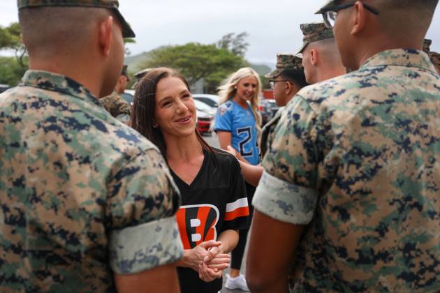 NFL cheerleader Whitney Schutt dons crash fire rescue equipment during ...