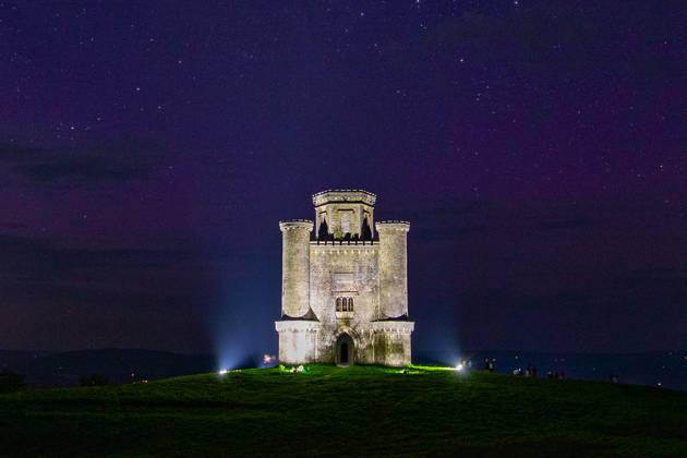 Light trails of spectators visiting Paxtons Tower in Carmarthenshire ...