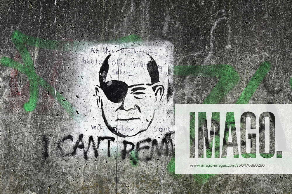 Graffito of Federal Chancellor Olaf Scholz with eye patch alluding to ...