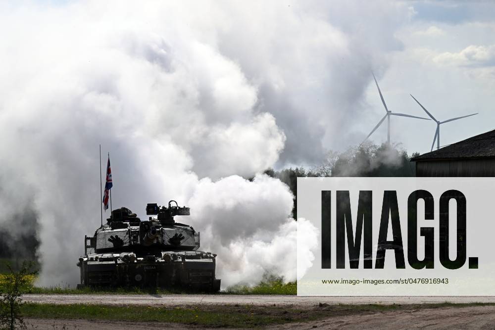 Challenger 2 main battle tank of the British forces makes a smoke ...