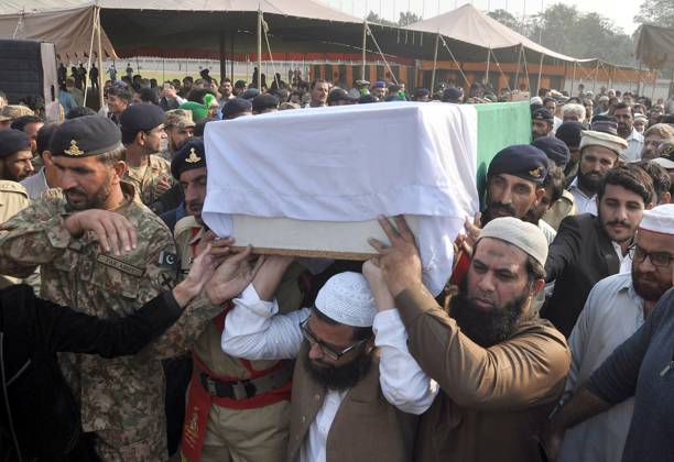 LAHORE, PAKISTAN, NOV 23: Funeral rituals of slain Major Muhammad Ishaq ...