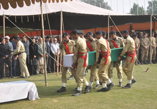LAHORE, PAKISTAN, NOV 23: Funeral rituals of slain Major Muhammad Ishaq ...