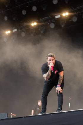 Nico Sallach singing during the performance of the German metalcore ...